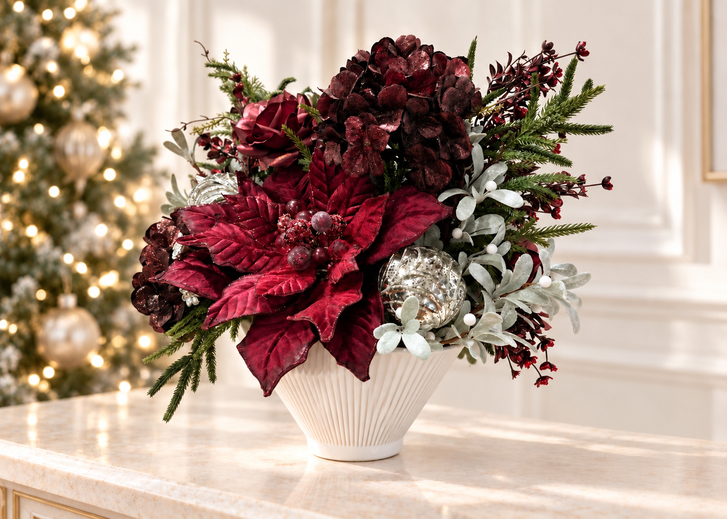 Elegant burgundy holiday floral arrangement in a white vase